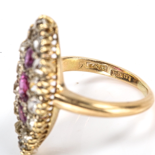 312 - An Edwardian 18ct gold ruby and diamond marquise cluster ring, set with oval and round-cut rubies wi... 