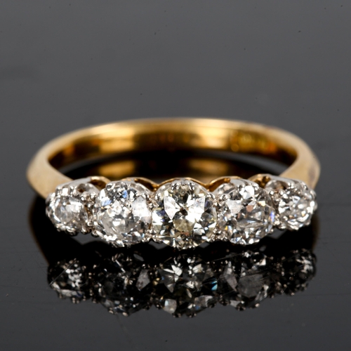 313 - An 18ct gold graduated 5-stone diamond half hoop ring, set with old European-cut diamonds, total dia... 