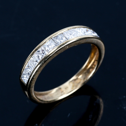 314 - A modern 9ct gold diamond half eternity ring set with Princess-cut diamonds, total diamond content a... 