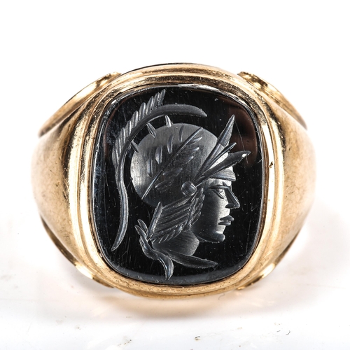 334 - A large 9ct gold haematite seal ring, intaglio carved with centurion profile, import hallmarks Londo... 