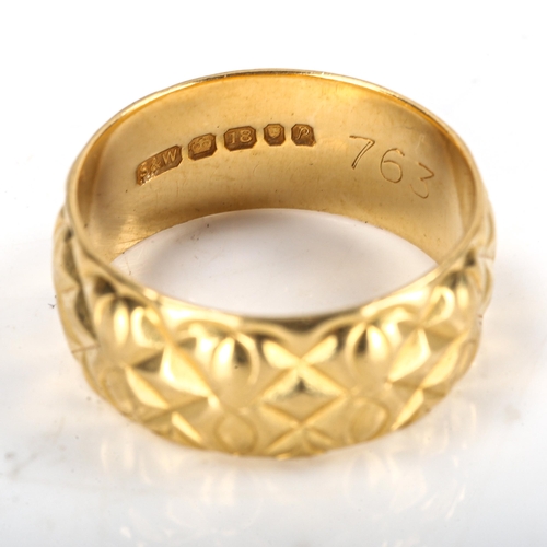 335 - A late 20th century 18ct gold wedding band ring, textured design, maker's marks S and W, hallmarks L... 