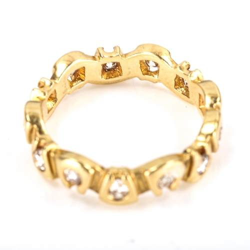 338 - A modern 18ct gold diamond eternity ring, abstract design set with modern round brilliant-cut diamon... 