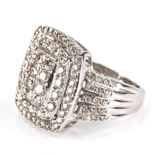 339 - A large modern 9ct white gold diamond cluster ring, set with modern round brilliant-cut diamonds, to... 