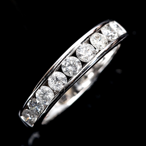 342 - A modern 18ct white gold diamond half eternity ring, set with modern round brilliant-cut diamonds, t... 