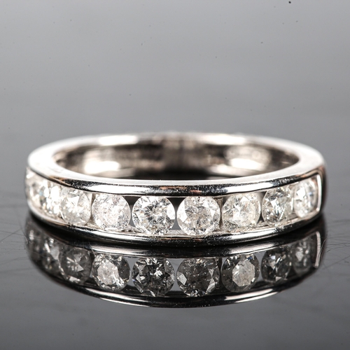 342 - A modern 18ct white gold diamond half eternity ring, set with modern round brilliant-cut diamonds, t... 