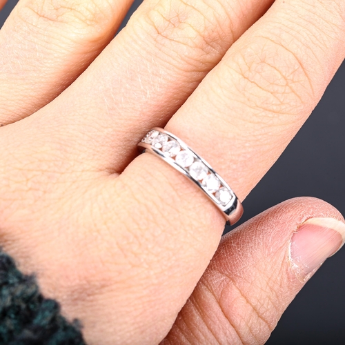 342 - A modern 18ct white gold diamond half eternity ring, set with modern round brilliant-cut diamonds, t... 