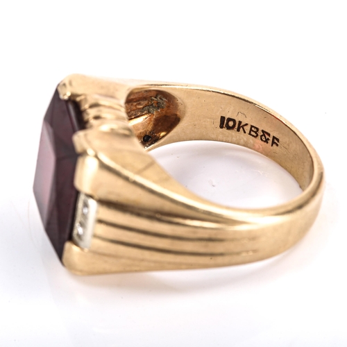 347 - A large American 9ct gold rubellite and diamond signet ring, setting height 15.6mm, size S, 11.4g