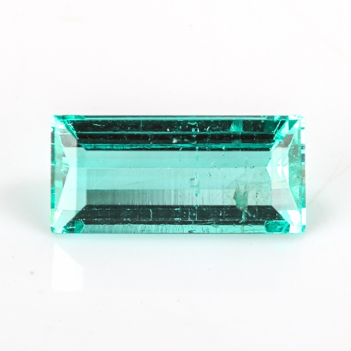 349 - 1.38ct unmounted rectangular step-cut emerald, measurements: 9.90mm x 4.64mm x 3.48mm, 0.28g