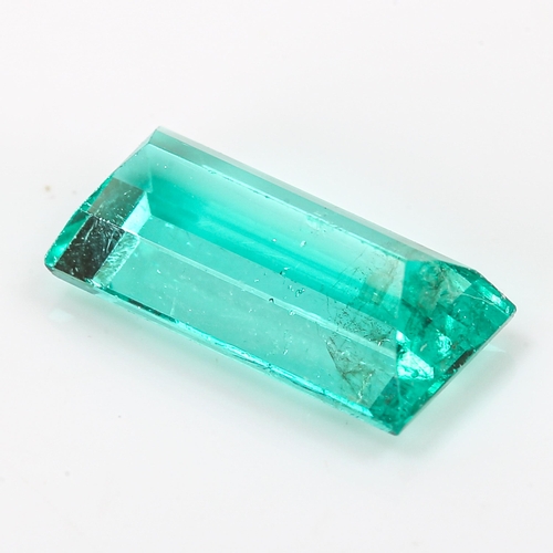 349 - 1.38ct unmounted rectangular step-cut emerald, measurements: 9.90mm x 4.64mm x 3.48mm, 0.28g