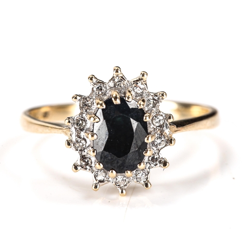 363 - A late 20th century 9ct gold sapphire and diamond oval cluster ring, set with oval mixed-cut sapphir... 