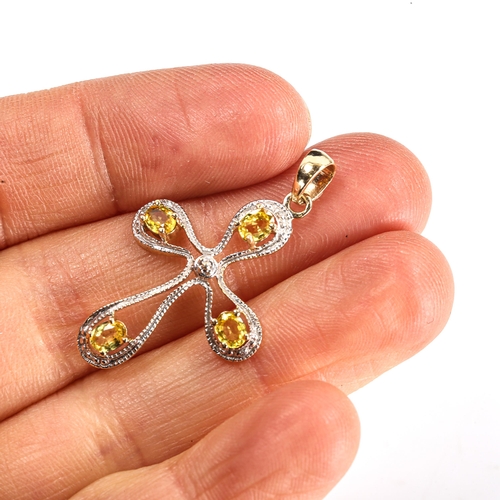 364 - A modern 9ct gold yellow sapphire and diamond stylised cross pendant, overall height 34mm, 1.8g