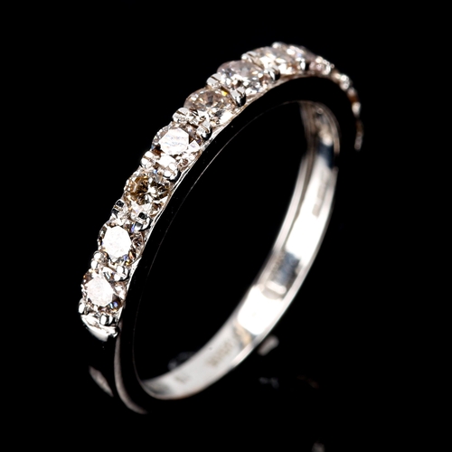 375 - A modern 9ct white gold diamond half eternity ring, set with modern round brilliant-cut diamonds, to... 