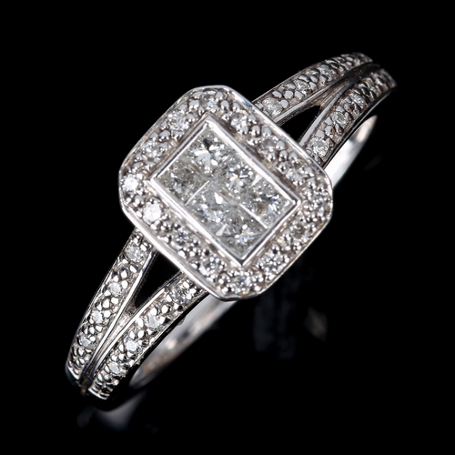 376 - A modern 18ct white gold diamond rectangular cluster ring, set with Princess and round brilliant-cut... 