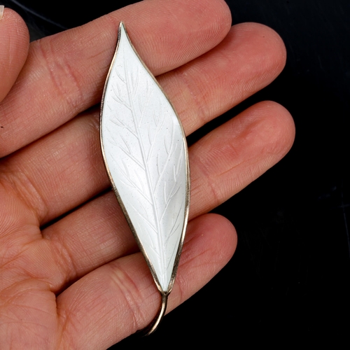 388 - DAVID ANDERSEN - a Vintage Norwegian vermeil sterling silver and white enamel leaf brooch, length 66... 