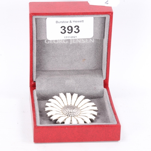 393 - GEORG JENSEN - a Danish sterling silver and white enamel daisy pattern brooch, diameter 43.8mm, 19.6... 