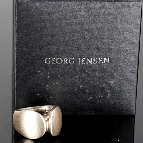 395 - GEORG JENSEN - a Vintage Danish sterling silver ring, designed by Henning Koppel, model no. 100, set... 