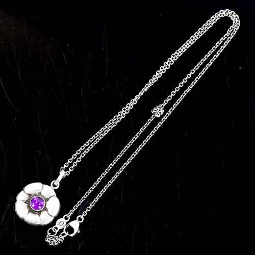 396 - GEORG JENSEN - a Vintage Danish sterling silver and amethyst flowerhead pendant necklace, on origina... 