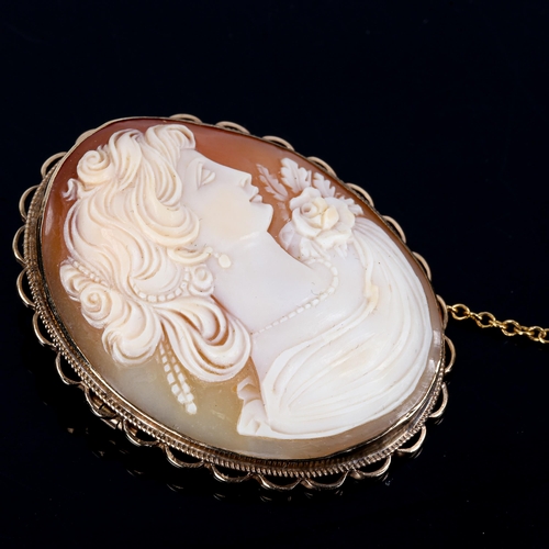 402 - A Vintage relief carved shell cameo brooch, depicting female profile, in 9ct gold frame, brooch heig... 