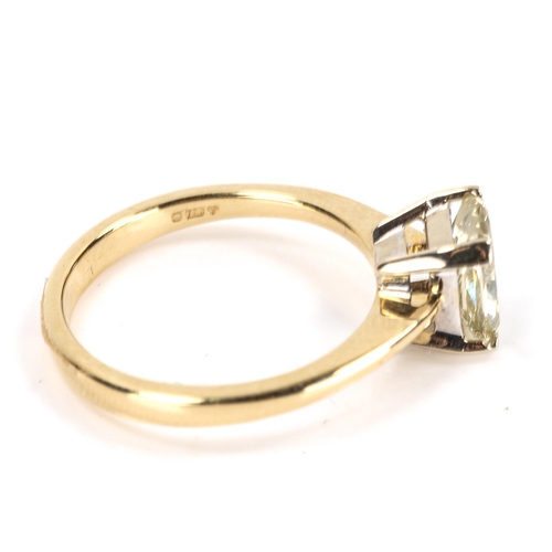 409 - A 1.21ct fancy light yellow emerald-cut solitaire diamond ring, 18ct yellow and white gold settings,... 