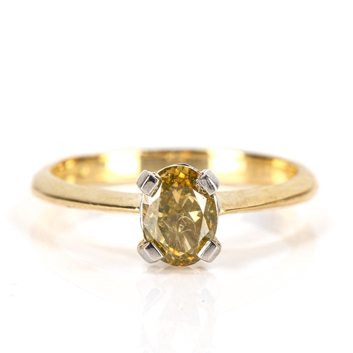 411 - A 1ct fancy dark greenish yellow oval-cut solitaire diamond ring, 18ct gold and platinum settings, c... 