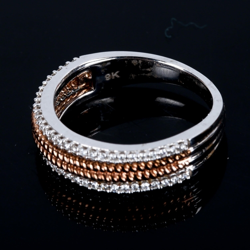 414 - A modern 9ct white and rose gold diamond half eternity ring, openwork rope twist centre flanked by r... 