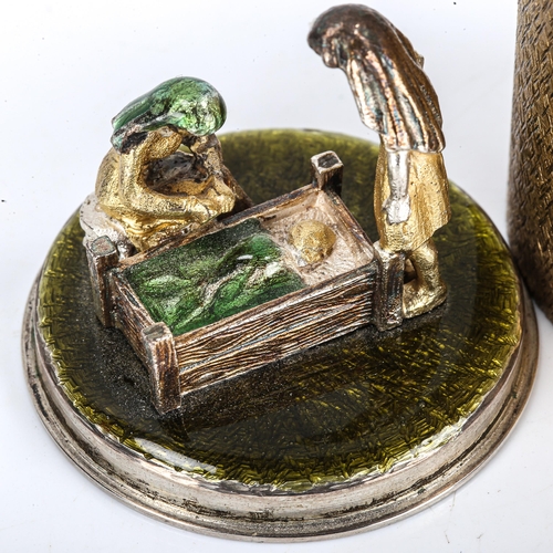 416 - STUART DEVLIN - an Elizabeth II silver-gilt 'Away In A Manger' Christmas Carol Surprise Box, cylindr... 