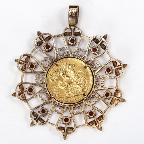 419 - A Queen Victoria 1899 full sovereign gold coin, in large 9ct gold garnet openwork pendant mount, ove... 