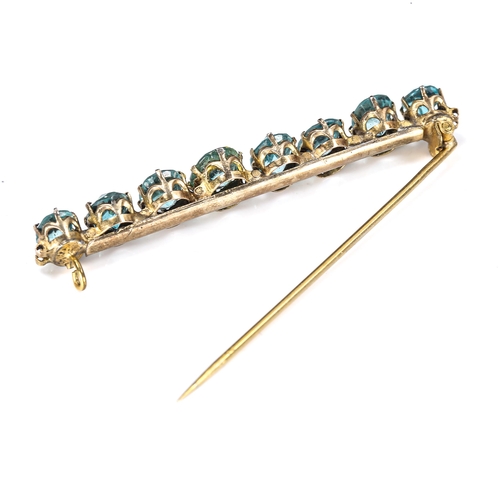 420 - A Vintage zircon line bar brooch, gilt-metal settings with oval mixed-cut zircon, largest length 8.5... 