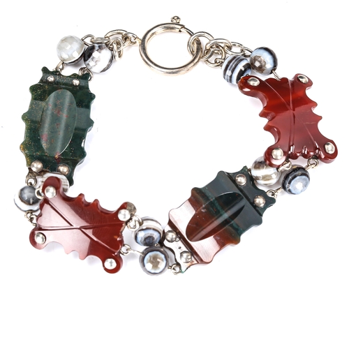 421 - A Scottish sterling silver and hardstone panel bracelet, hardstones include bloodstone, banded agate... 