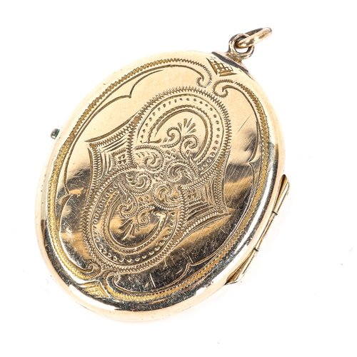 316 - A Victorian locket pendant, engraved decoration depicting Russian Kossack on horseback, unmarked yel... 