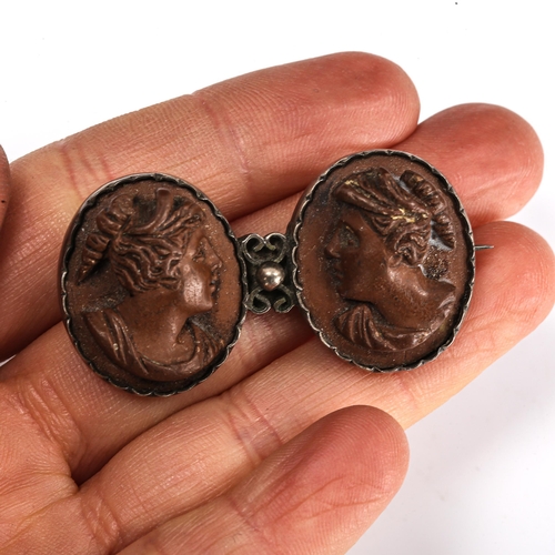 432 - A Victorian relief carved lava cameo brooch, depicting female profiles, brooch length 46.1mm, 15.4g