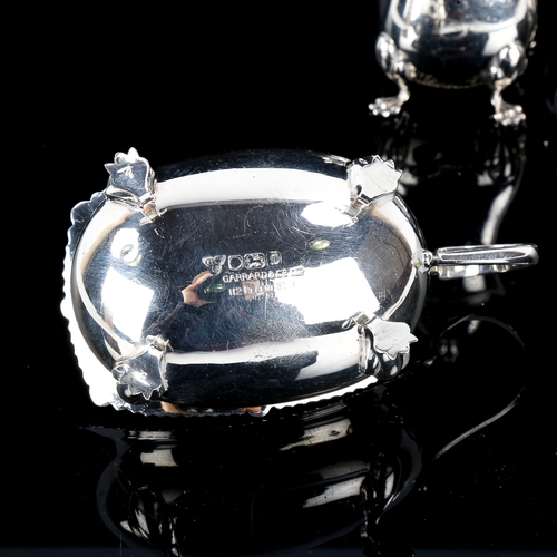 455 - GARRARD - an Elizabeth II silver 3-piece cruet set, comprising mustard pot, pepperette and salt cell... 