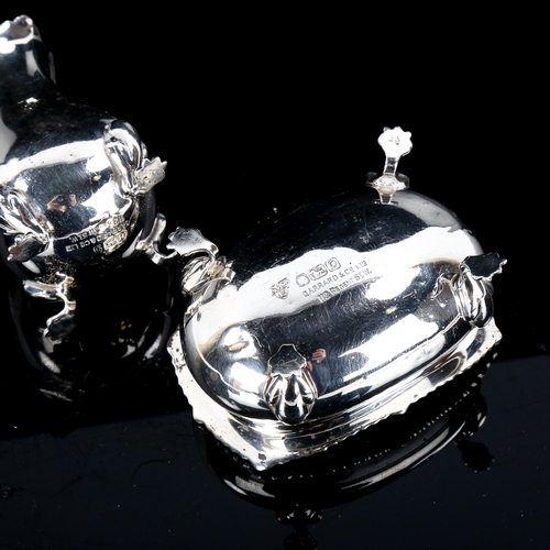 455 - GARRARD - an Elizabeth II silver 3-piece cruet set, comprising mustard pot, pepperette and salt cell... 