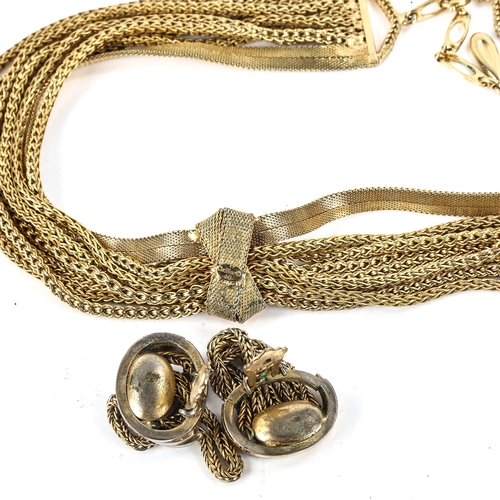 480 - CHRISTIAN DIOR - a Vintage gilt-metal multi-strand demi-parure, comprising necklace and pair of clip... 