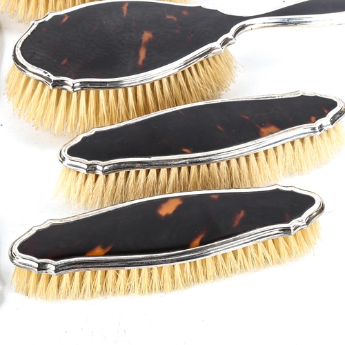 481 - A George V silver and tortoiseshell 5-piece dressing table set, comprising hand mirror, 2 hair brush... 