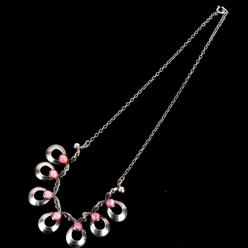 482 - HERMANN SIERSBOL - a Vintage Danish stylised sterling silver and pink moonstone necklace, length 44c... 