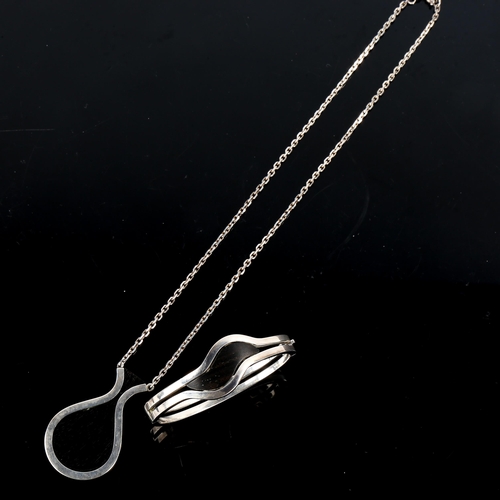 492 - JENS JOHS AAGAARD - a Vintage Danish stylised sterling silver and ebony matching pendant necklace an... 