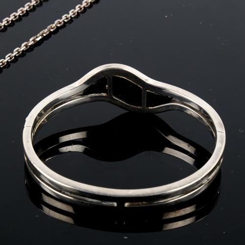 492 - JENS JOHS AAGAARD - a Vintage Danish stylised sterling silver and ebony matching pendant necklace an... 