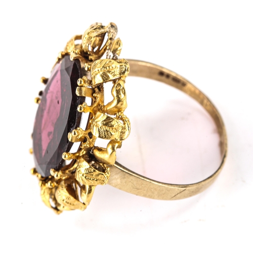 505 - A large Antique flat top garnet ring, unmarked gold floral surround, setting height 25.2mm, size P, ... 