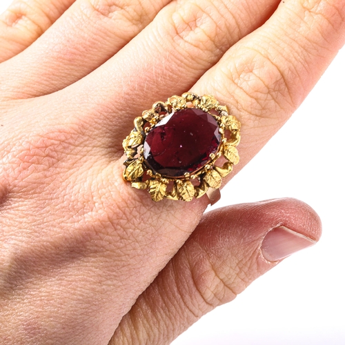 505 - A large Antique flat top garnet ring, unmarked gold floral surround, setting height 25.2mm, size P, ... 