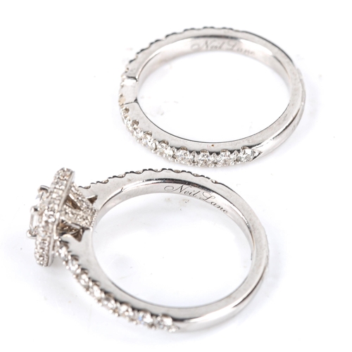 507 - A modern 14ct white gold diamond bridal engagement ring set, comprising halo cluster and half eterni... 