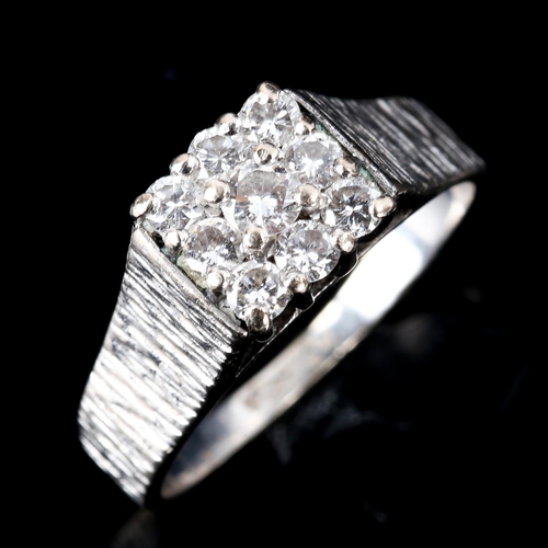 509 - A late 20th century 18ct white gold diamond square cluster ring, set with modern round brilliant-cut... 