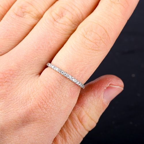 512 - An 18ct white gold diamond half eternity ring, set with modern round brilliant-cut diamonds, total d... 