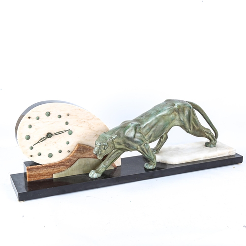 1262 - An large Art deco marble faced clock with a bronzed spelter panther figure, length 77cm