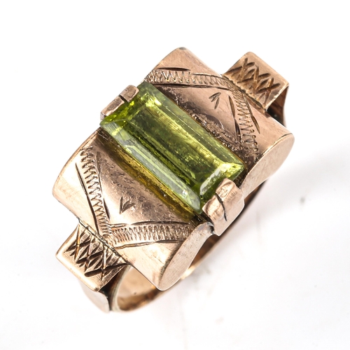 515 - A Continental peridot bombe ring, circa 1940s, unmarked gold settings with rectangular-cut peridot, ... 