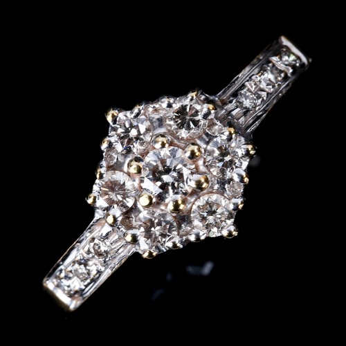 524 - A modern 9ct gold diamond cluster flowerhead ring, set with modern round brilliant-cut diamonds, tot... 