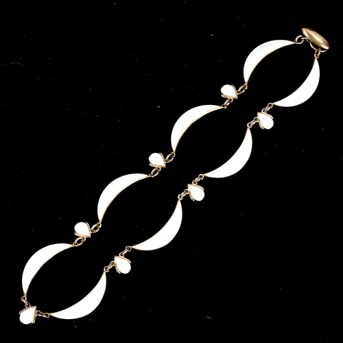 528 - VOLMER BAHNER - a Vintage Danish vermeil sterling silver and white enamel necklace, length 38cm, 22.... 