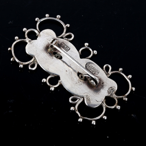 534 - A large mid-century Mexican silver brooch, by William Spratling of Taxco, circa 1940, length 66.8mm,... 