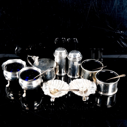 550 - Various silver cruets, including drum mustard pot, pair of pepperettes, shell salts etc, 9oz weighab... 