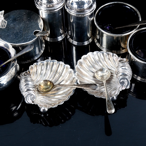 550 - Various silver cruets, including drum mustard pot, pair of pepperettes, shell salts etc, 9oz weighab... 